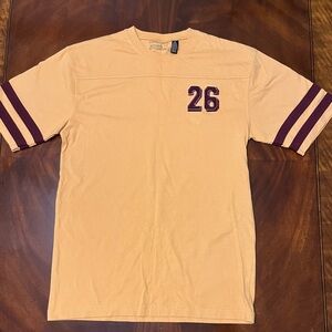 Men's Yellow Short Sleeve Graphic Tee with Burgundy Number and Stripe Accents